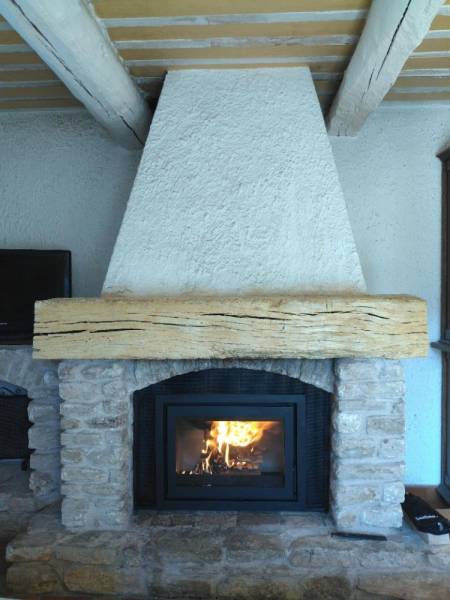 Obtimiser votre cheminée existante avec un appareil de chauffage au bois performant et esthétique